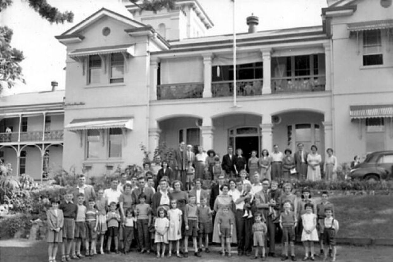 Migrants out the front of the historic Yungaba House, Kangaroo Point, Brisbane.